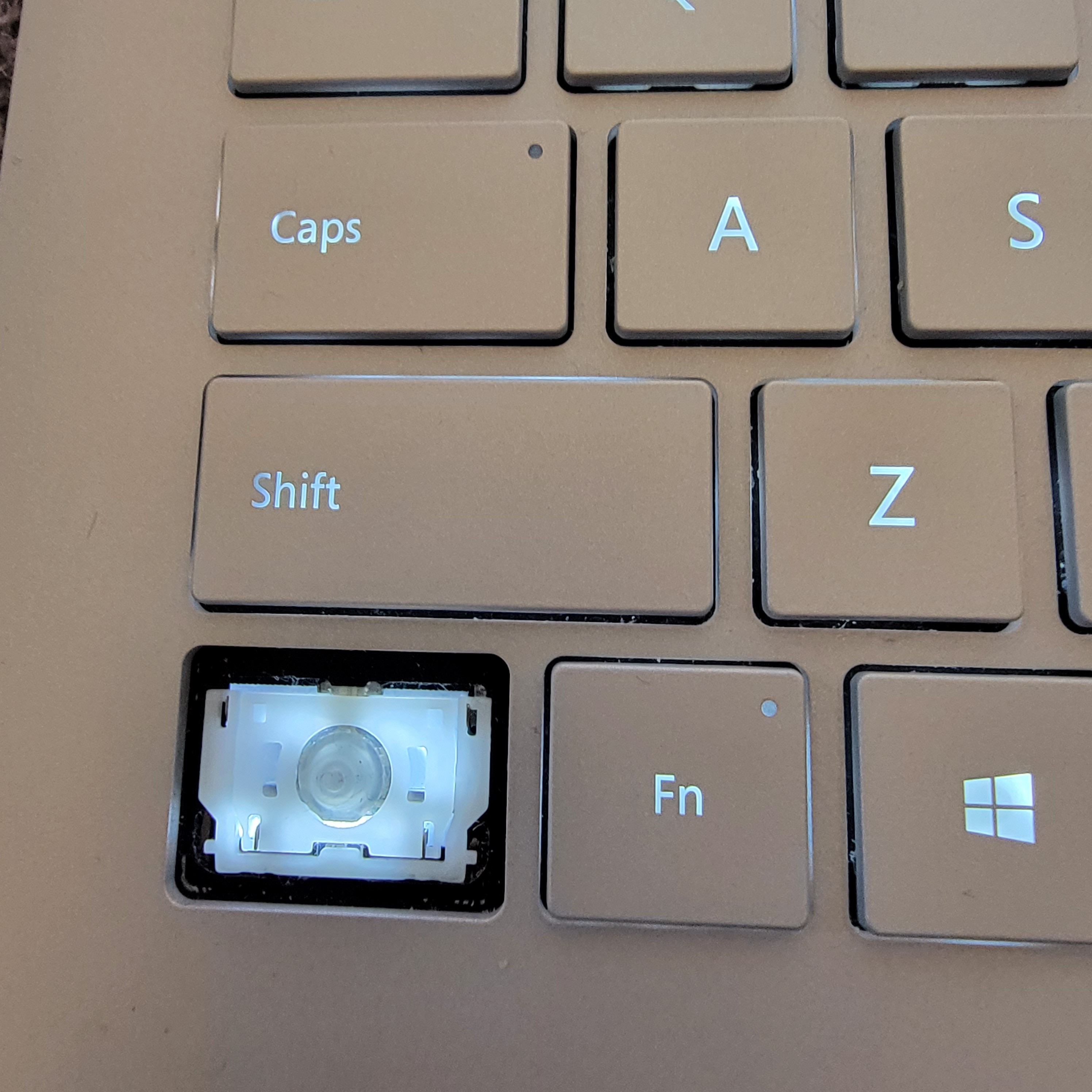 How do I get a replacement key for MS Surface book 3 - Microsoft Community