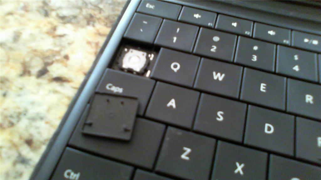 how to put a key back on a laptop keyboard